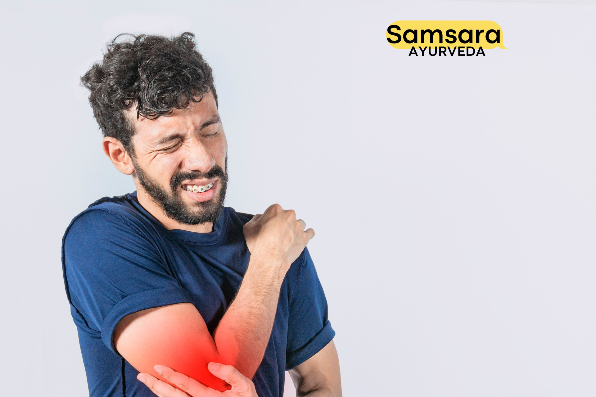 A person gently stretching their arm to relieve tennis elbow pain.